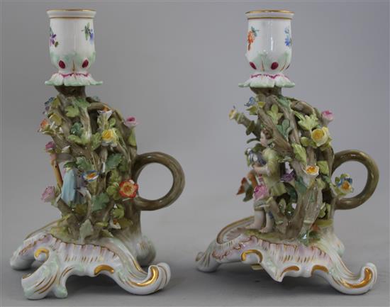 A pair of Meissen arbour chambersticks, early 20th century, 13.5cm, both with losses